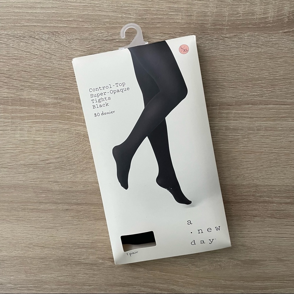 L/XL women’s opaque black tights with control top. New With Tags!